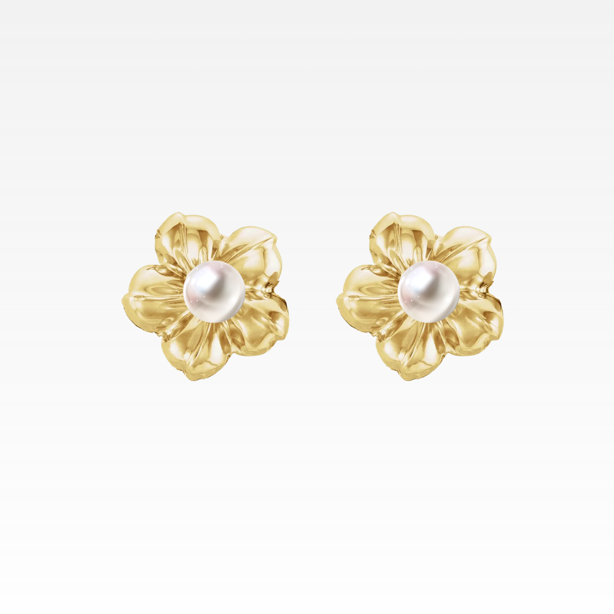 Gold-plated floral stud earrings with clear white pearls.