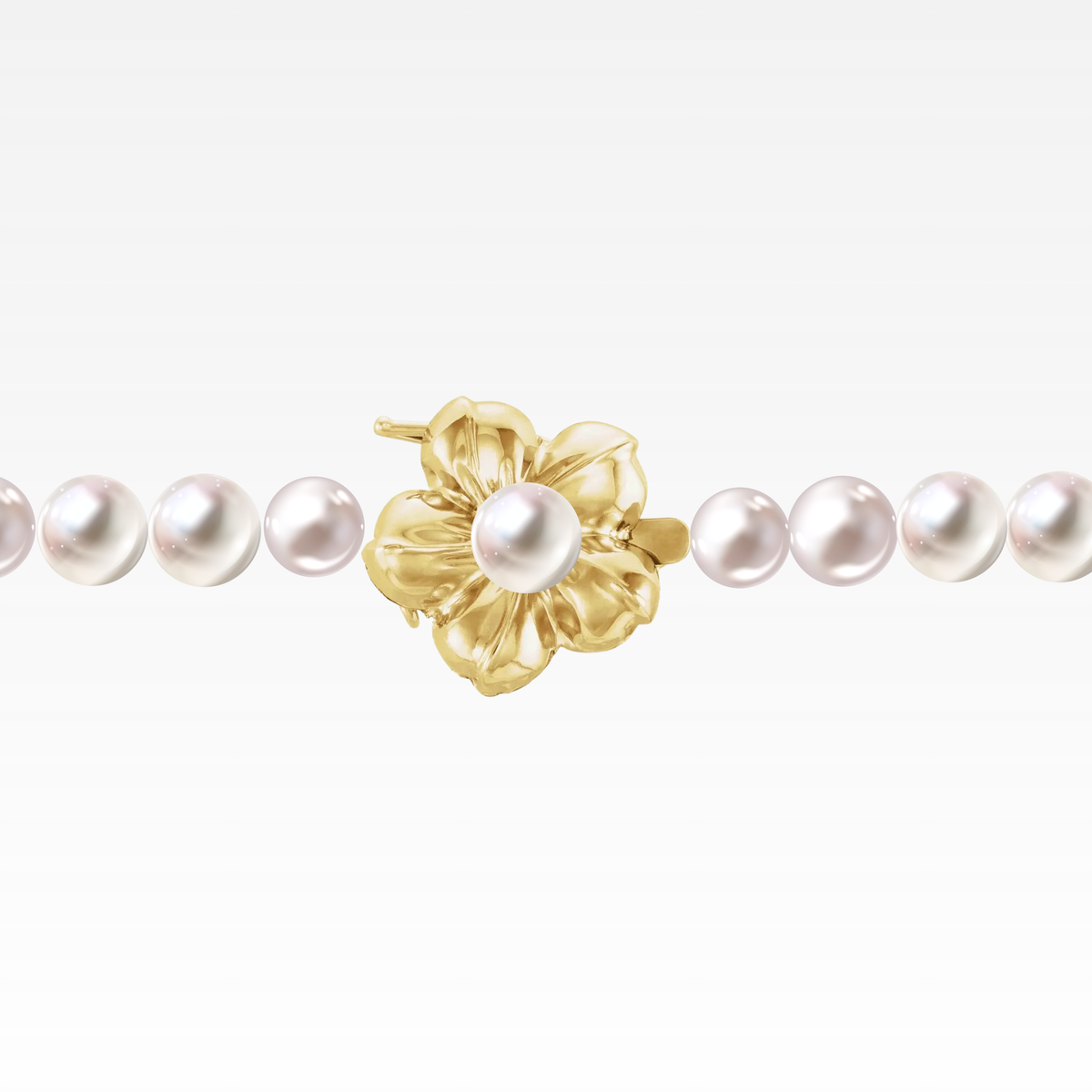 30-inch yellow gold necklace with white pearls and a flower clasp.