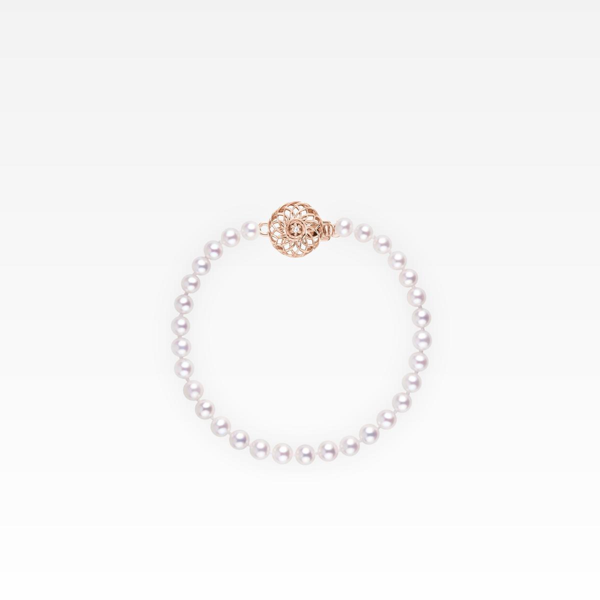 Cream pearl bracelet with a rose-gold finish.